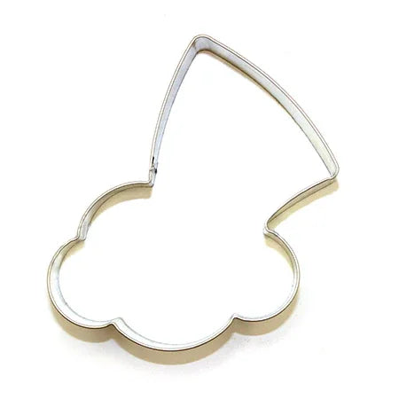 Metal cloud and rainbow shaped cookie cutter on white background