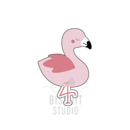 A plastic cookie cutter in the shape of a pink flamingo by Biscuit Studio.