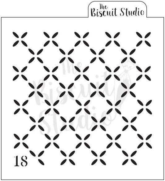 Reusable stencil with repeating floral petal pattern for cookies or cake decorating.