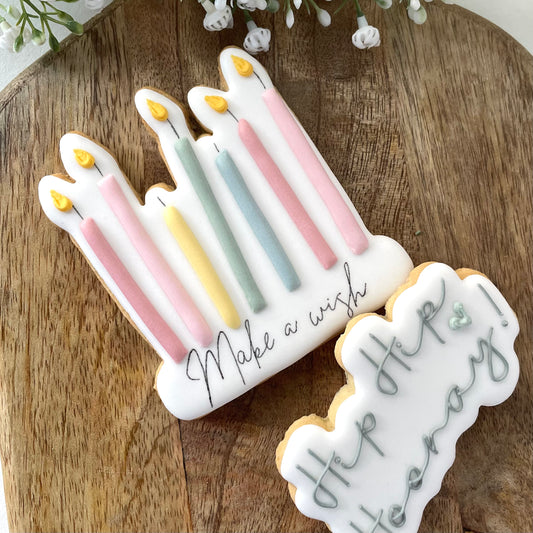 Decorative cookies shaped like candles by Biscuit Sudio