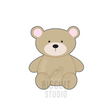 A cookie cutter in the shape of a sitting teddy bear with a beige body and pink ears by Biscuit Studio.