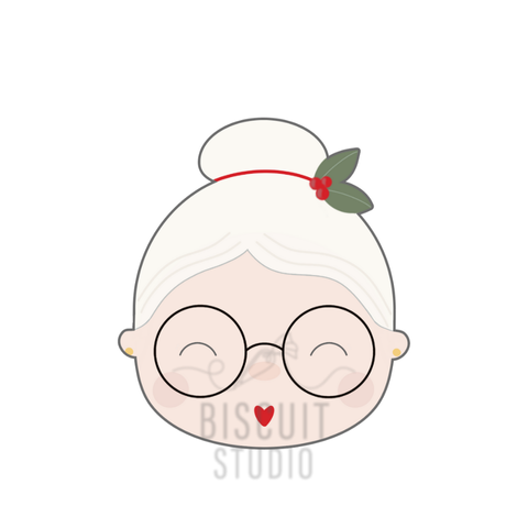 Mrs. Claus with holly cookie cutter