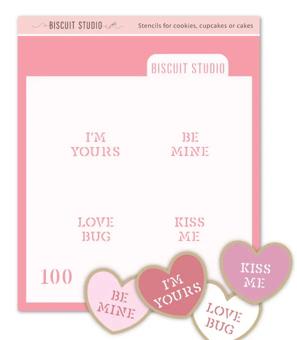 Valentine candy heart stencil sheet with 'Be Mine', 'Kiss Me', 'I'm Yours' sayings for cookies