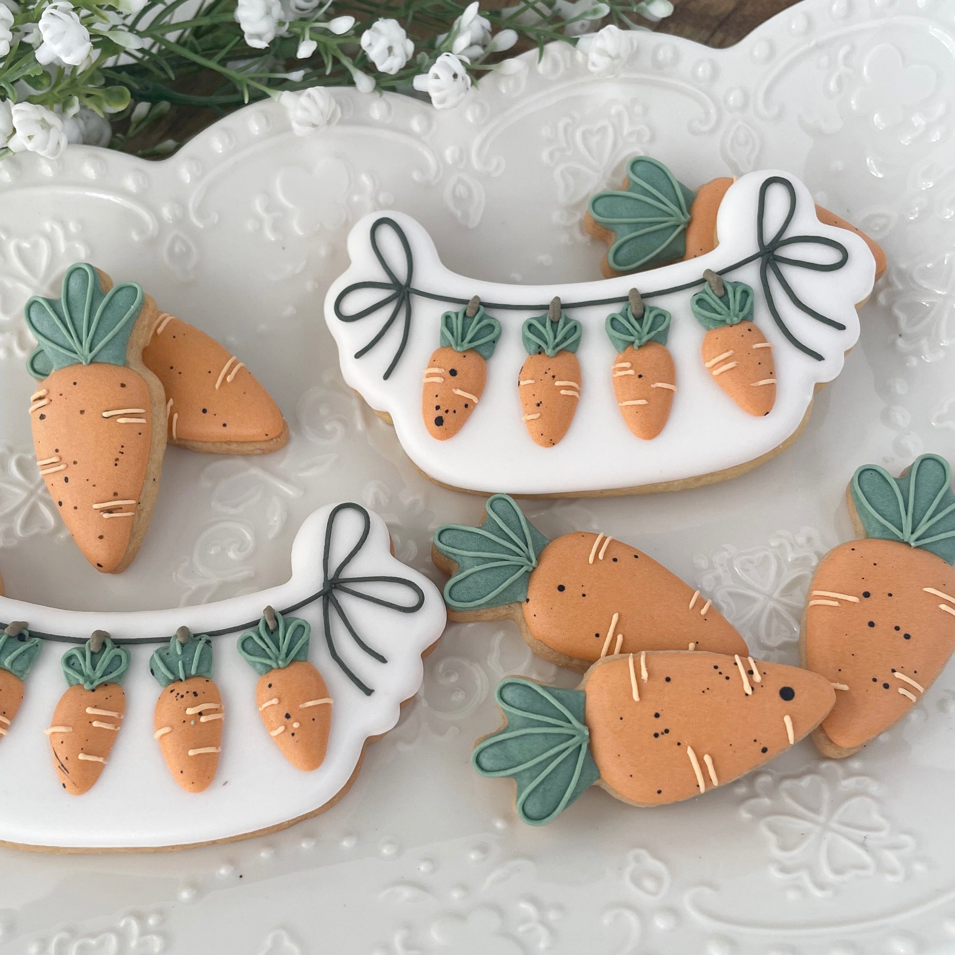 Hanging Carrots Cookie Cutter – shown with decorated cookie example