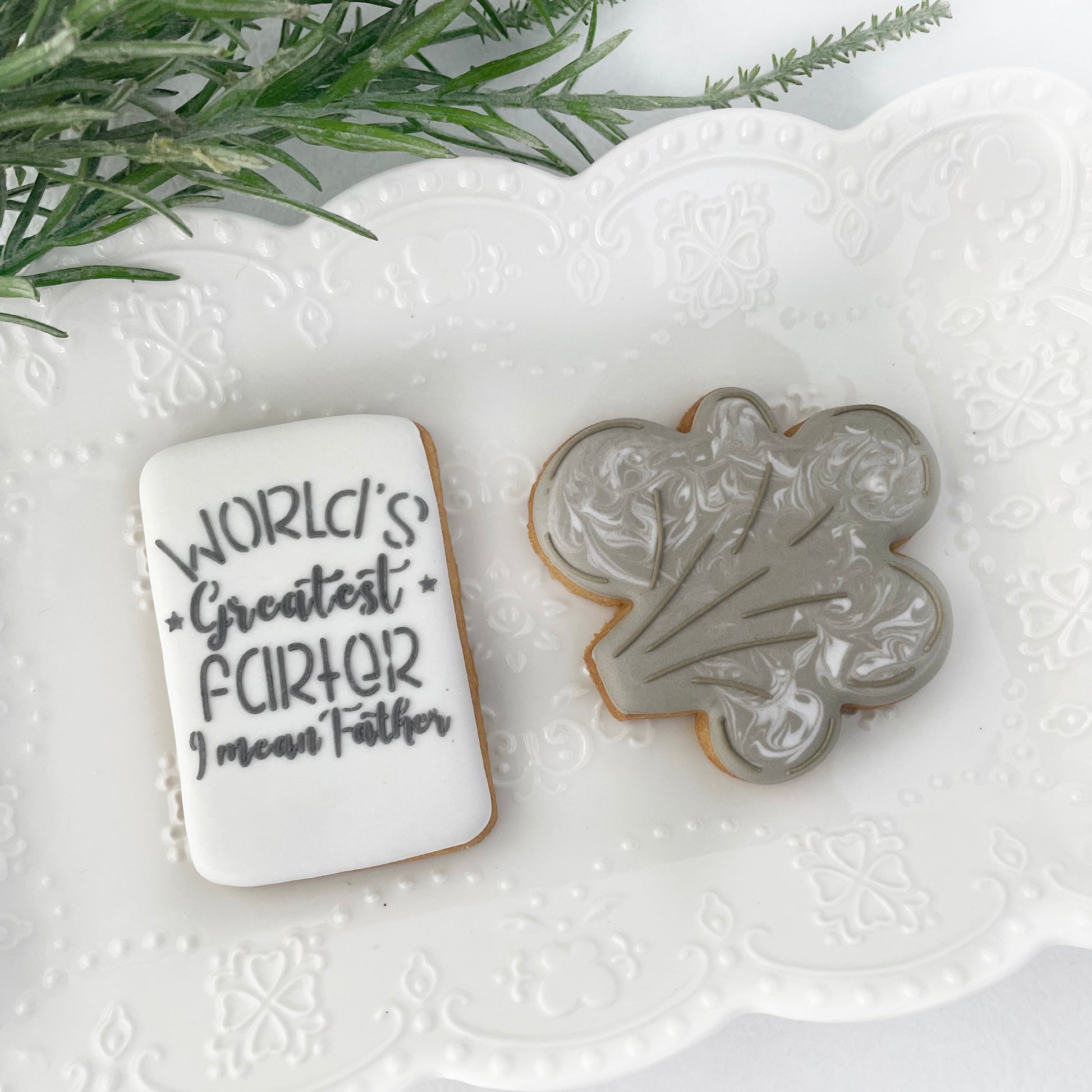 Worlds greatest farter cookie stencil – shown with decorated cookie example