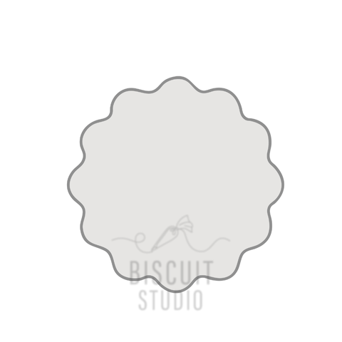 Round wavy cookie cutter with Biscuit Studio logo